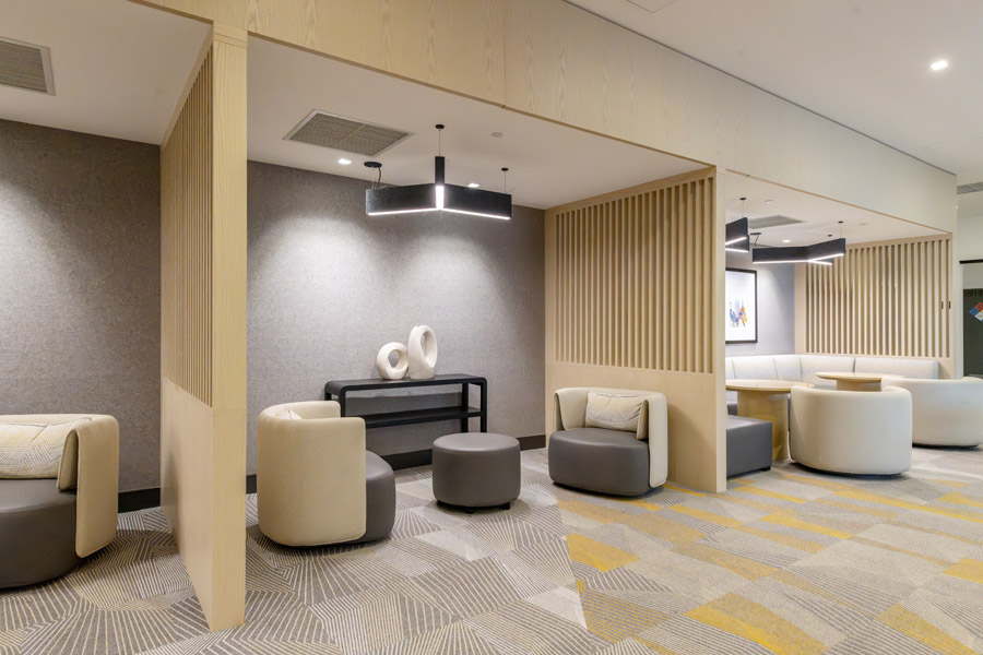58_work_lounge Resident lounge with comfortable seating, meeting areas, and coworking spaces.