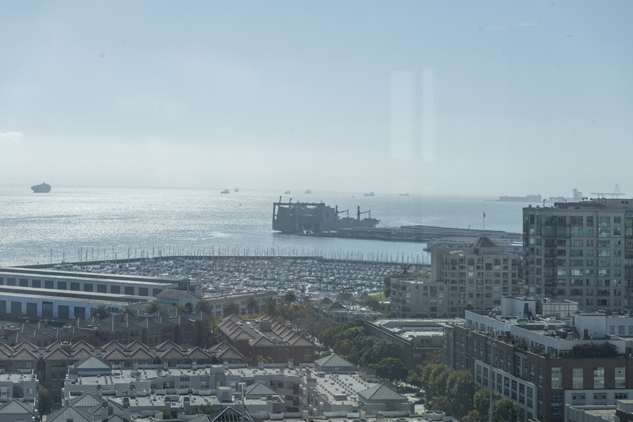 30_view Bay view framed by neighboring high-rise buildings and city skyline.